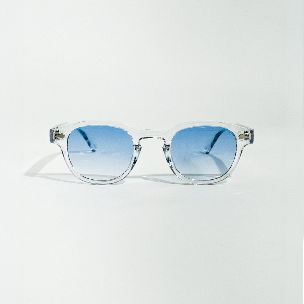 Blue Clarity transparent frame sunglasses with round blue gradient lenses.
