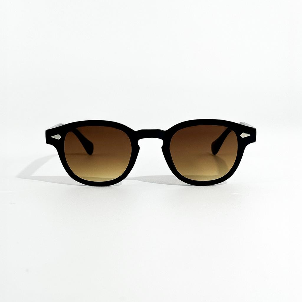 Choco Chic brown gradient sunglasses with black frames and UV 400 protection.