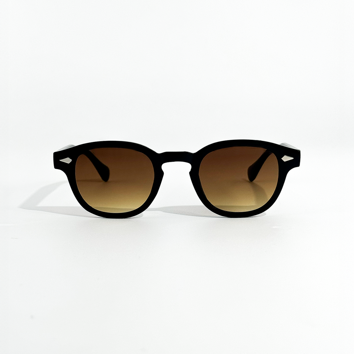 Choco Chic brown gradient sunglasses with black frames and UV 400 protection.
