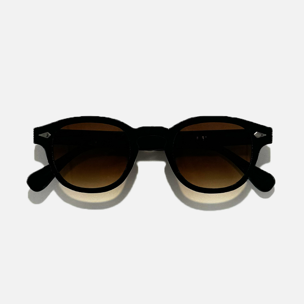 Choco Chic black gradient sunglasses with brown lenses and UV 400 protection.
