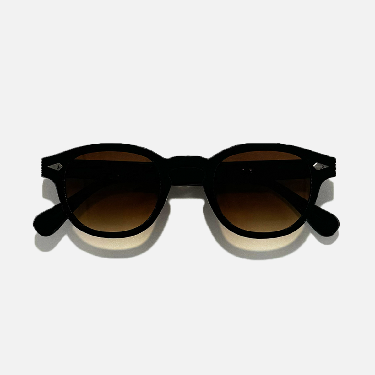 Choco Chic black gradient sunglasses with brown lenses and UV 400 protection.