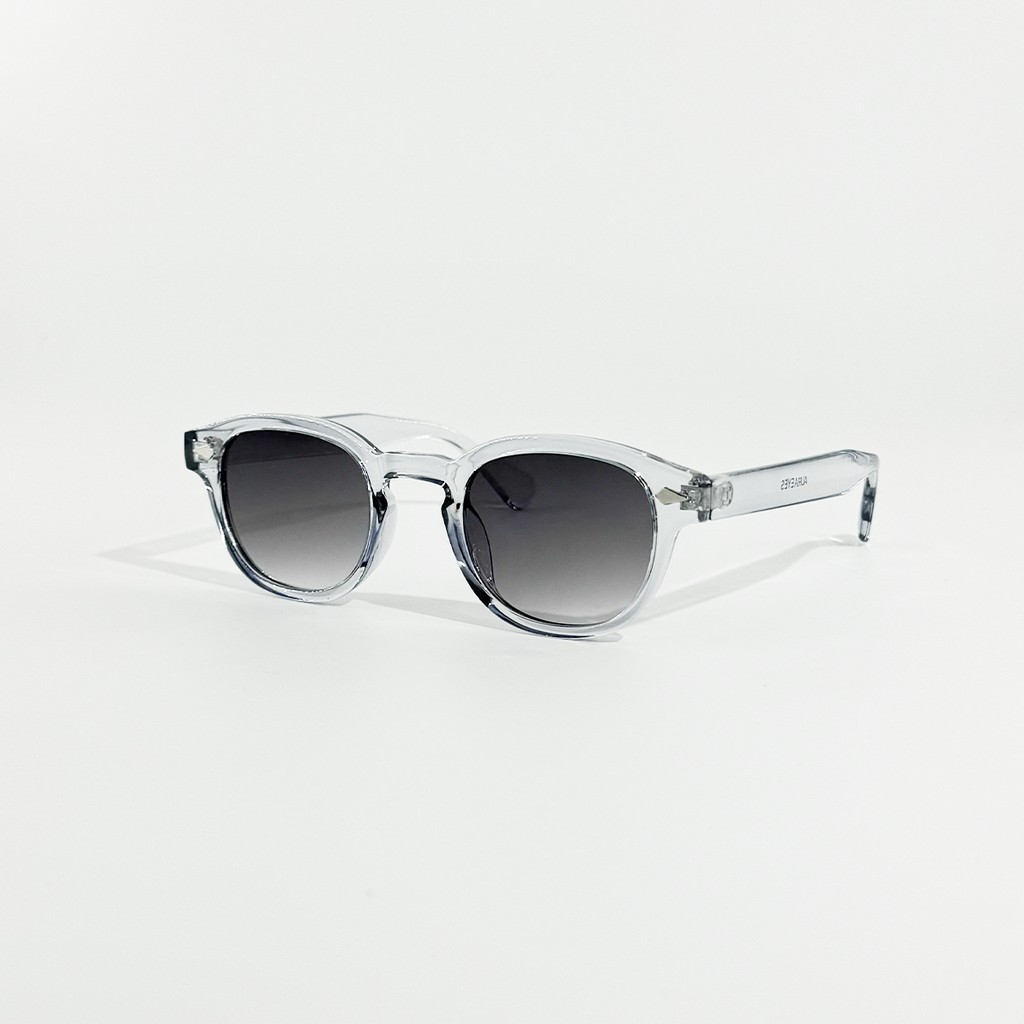 Crystal Tide transparent frame sunglasses with round, dark grey gradient lenses and UV 400 protection.