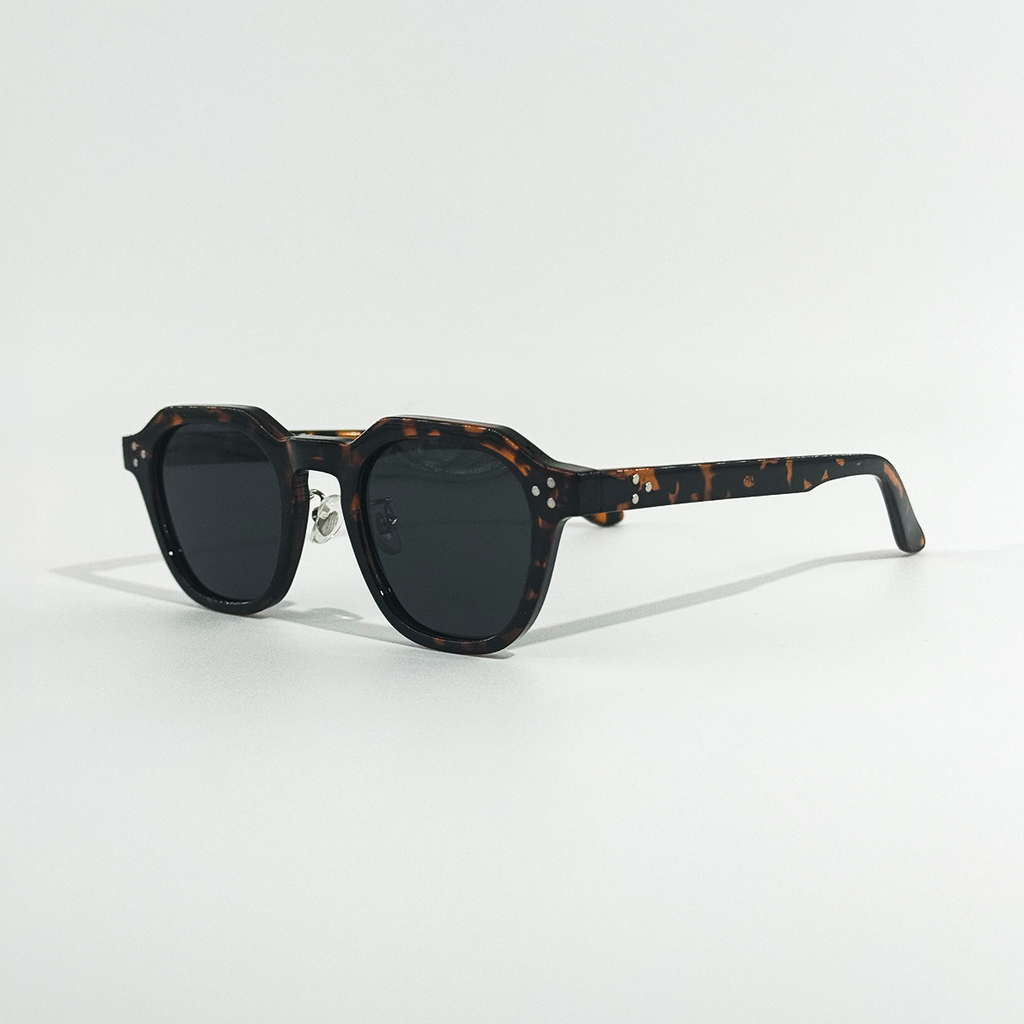 Dark Havana frame sunglasses with black lenses, featuring a stylish, durable design.