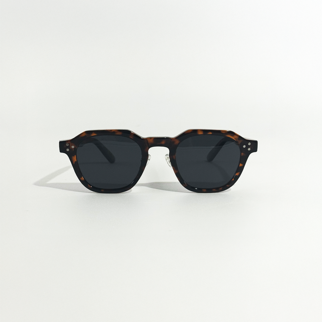 Dark Havana frame sunglasses with black lenses and a stylish, durable design.
