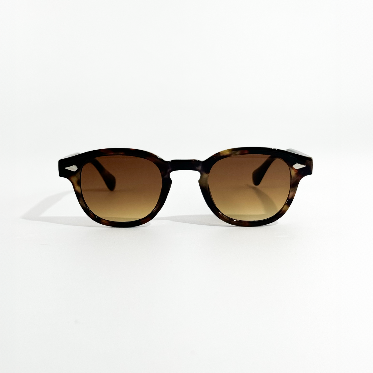 Golden Havana brown lens sunglasses from the SS26 Circle Collection, featuring UV 400 protection.
