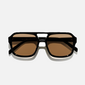 Golden Noir sunglasses with a black polycarbonate frame and gold lenses.