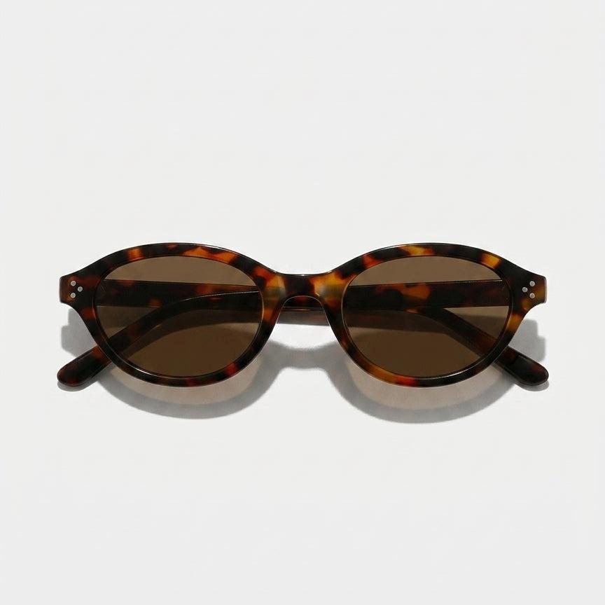 Havana Muse Dark Havana Brown Lens Oval Sunglasses with UV400 protection.