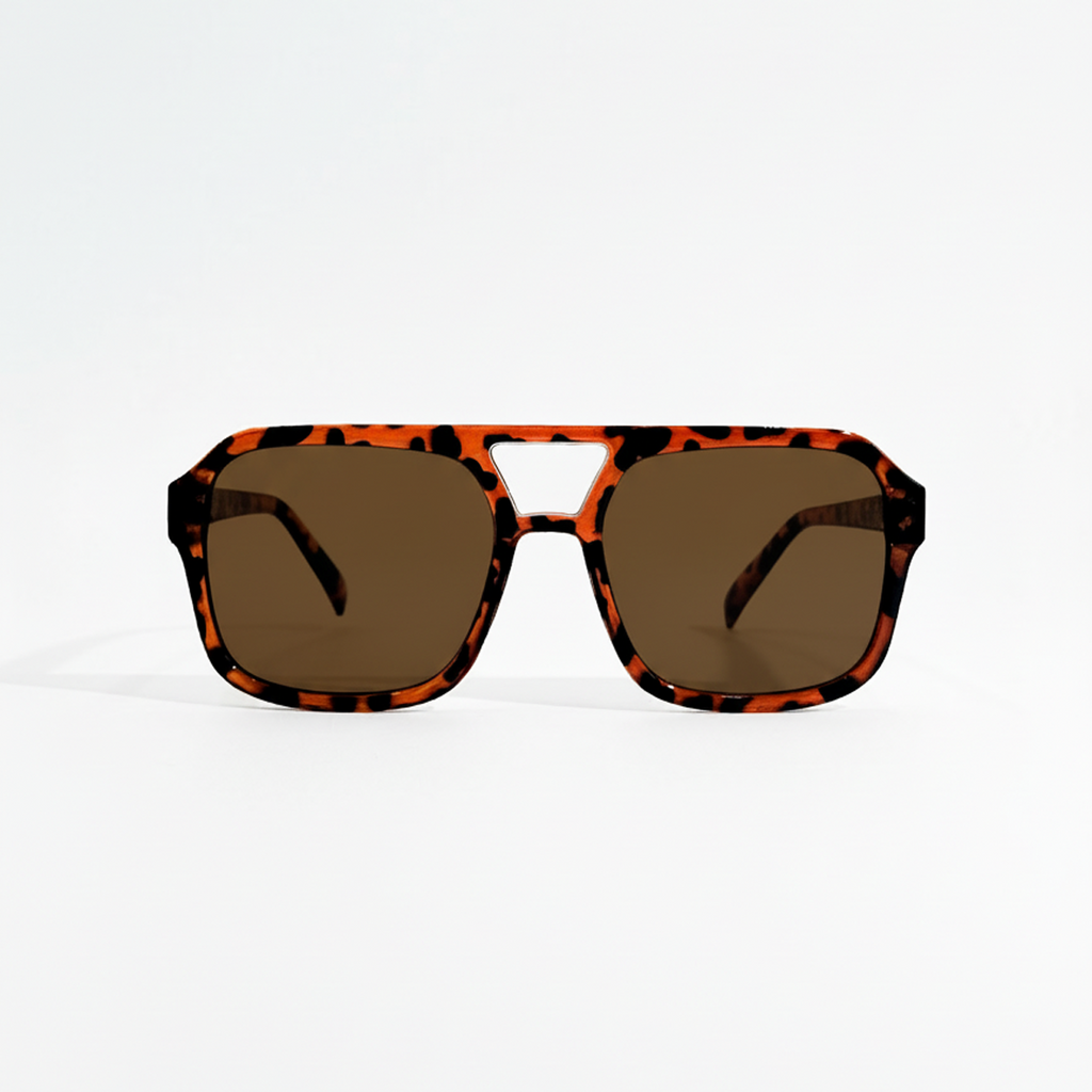 Havana pilot sunglasses with dark black lenses and a tortoiseshell frame on a white background.