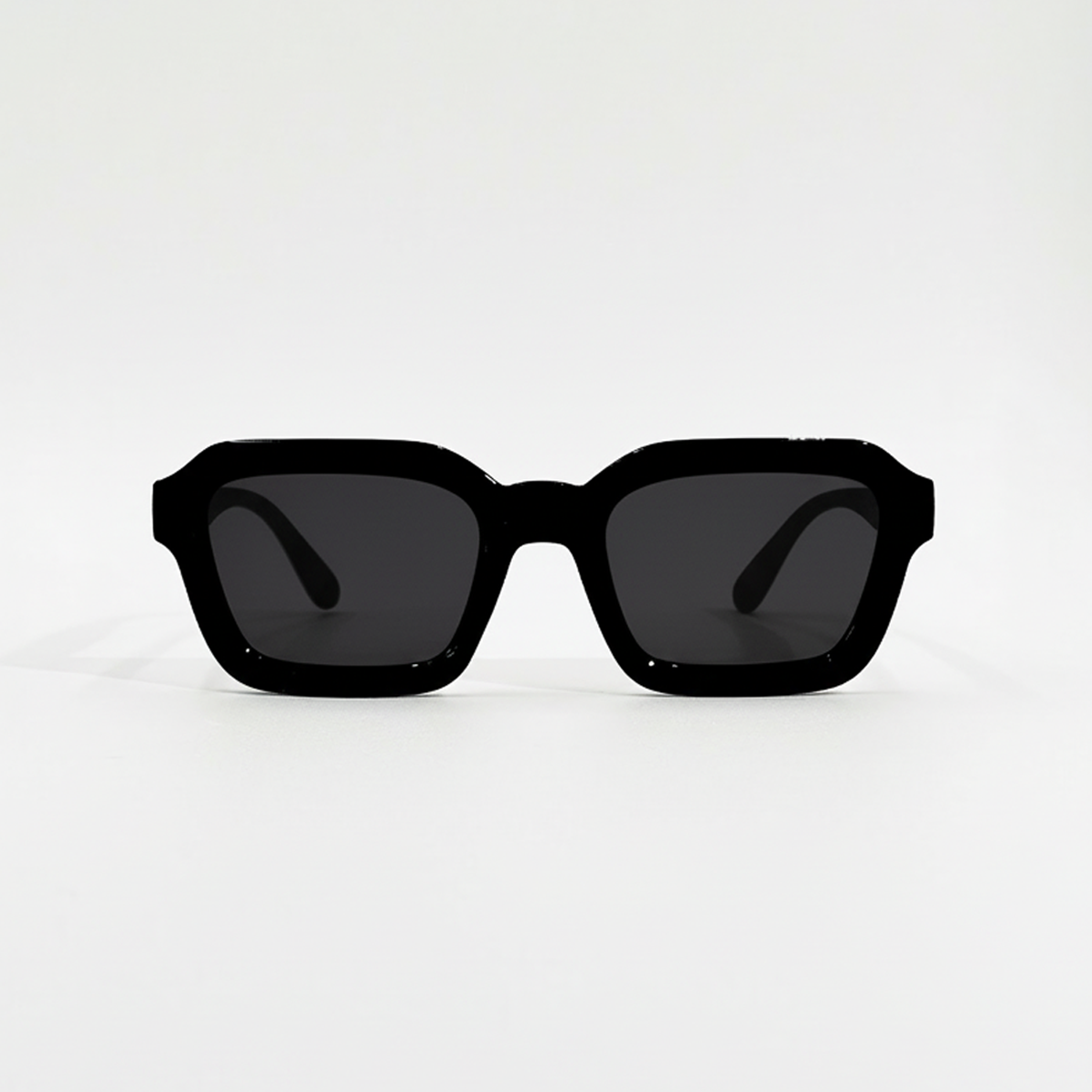 Midnight Noir black lens square sunglasses with thick frames and UV400 protection.