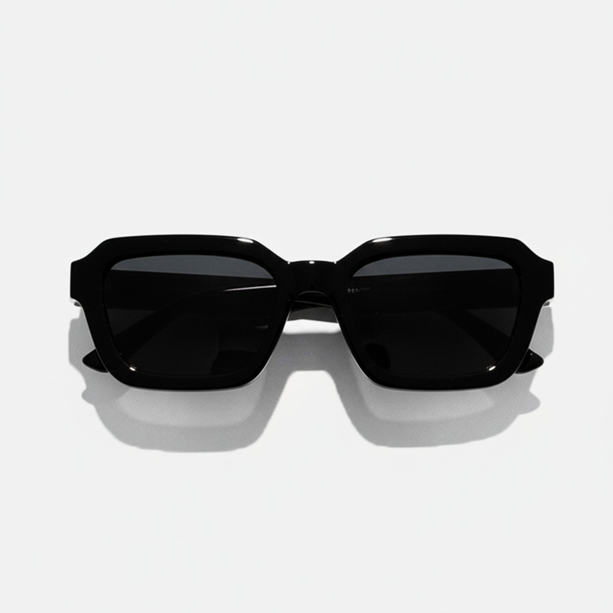 Midnight Noir black lens square sunglasses with thick frames, offering UV400 protection.
