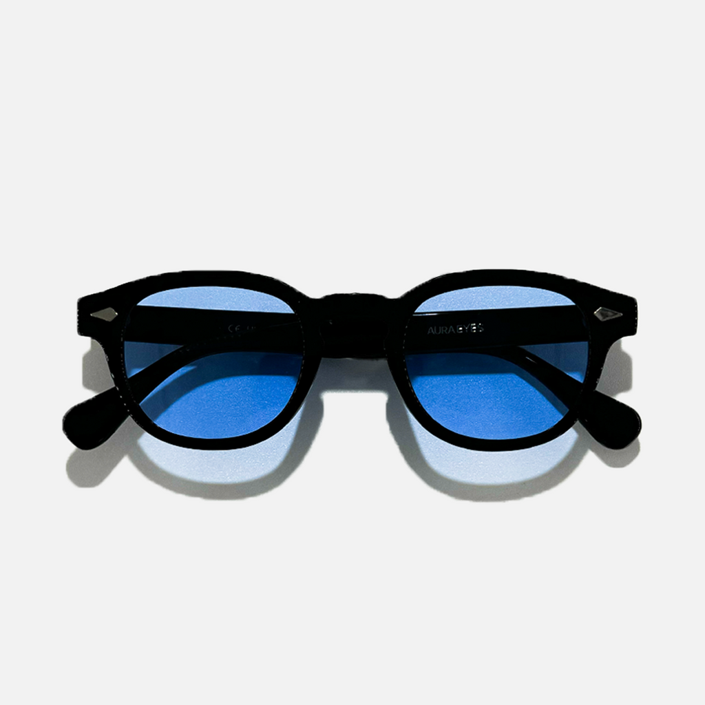 Black round frame sunglasses with mystical sky blue lenses, offering UV 400 protection.
