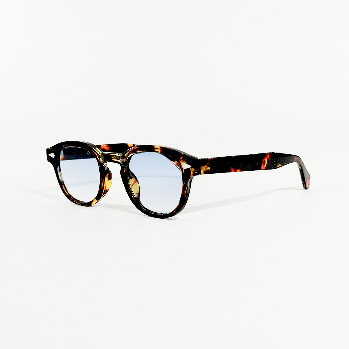 Amber tortoise shell circle sunglasses with ocean blue gradient lenses.