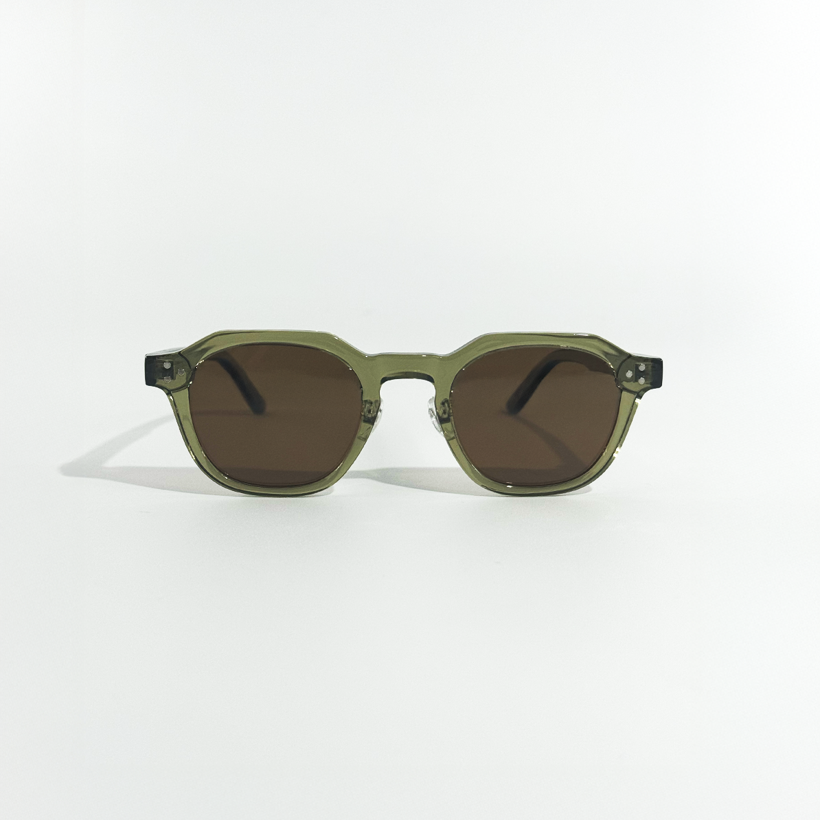 Olive Dusk panto sunglasses with crystal olive frame and brown lenses.